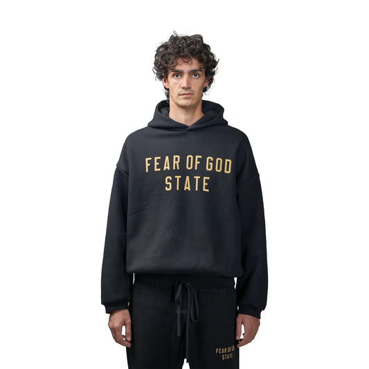 FearofGodEssentialsFleeceHoodieBlack_FW24_-ModelFront